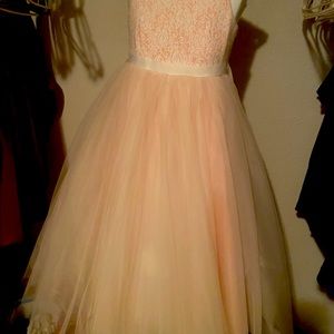 Flower girl dress from David’s bridal. Paid 175